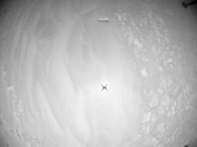 This image was taken by HELI_NAV onboard NASA's Mars rover Perseverance on Sol 910