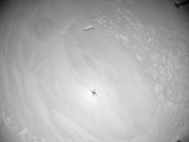 This image was taken by HELI_NAV onboard NASA's Mars rover Perseverance on Sol 910