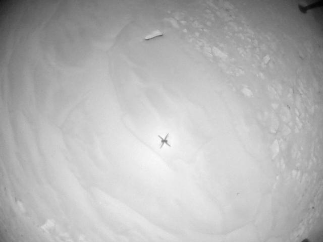 This image was taken by HELI_NAV onboard NASA's Mars rover Perseverance on Sol 910