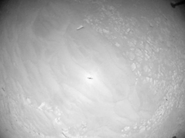 This image was taken by HELI_NAV onboard NASA's Mars rover Perseverance on Sol 915