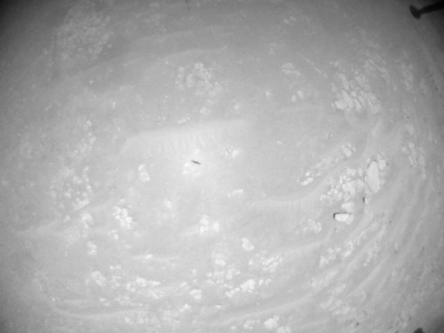 This image was taken by HELI_NAV onboard NASA's Mars rover Perseverance on Sol 933