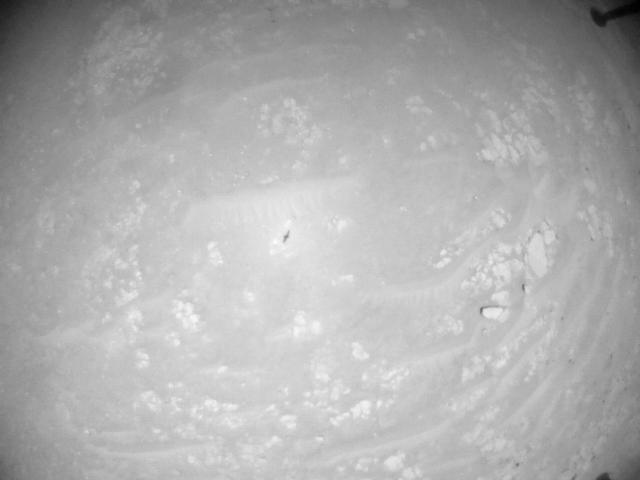 This image was taken by HELI_NAV onboard NASA's Mars rover Perseverance on Sol 933