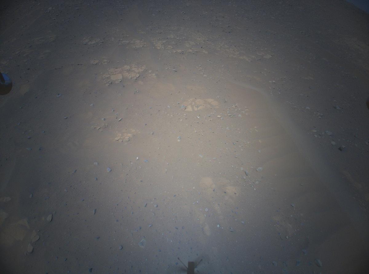 This image was taken by HELI_RTE onboard NASA's Mars rover Perseverance on Sol 933