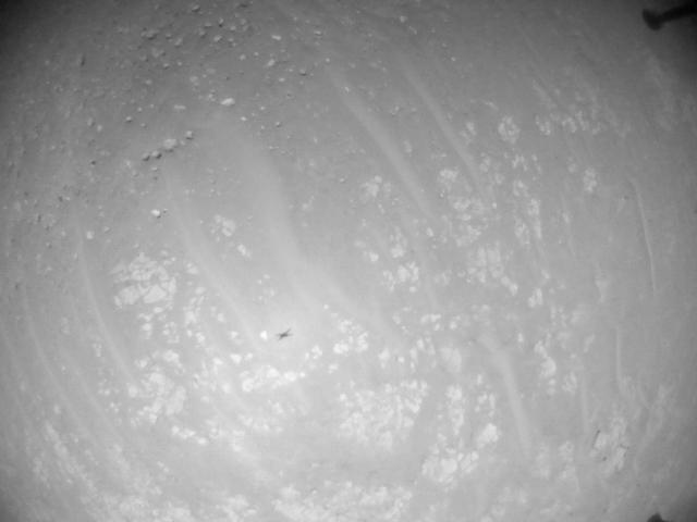 This image was taken by HELI_NAV onboard NASA's Mars rover Perseverance on Sol 940