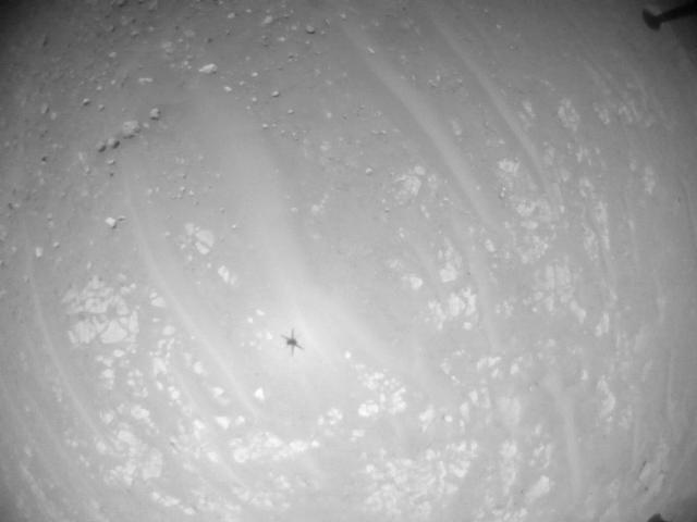 This image was taken by HELI_NAV onboard NASA's Mars rover Perseverance on Sol 940