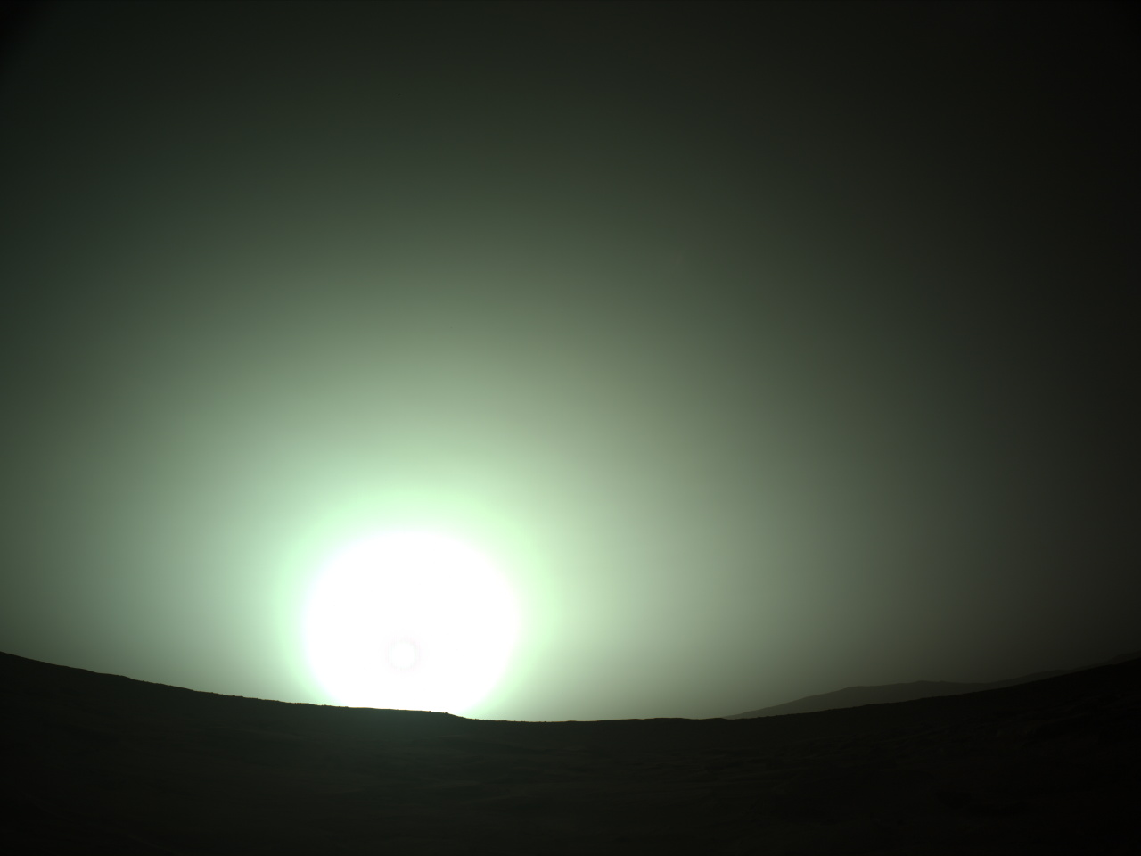 NASA's Mars Perseverance rover acquired this image using its onboard Left Navigation Camera (Navcam). The camera is located high on the rover's mast and aids in driving. 

This image was acquired on  Oct. 13, 2023 (Sol 941) at the local mean solar time of 05:34:00.