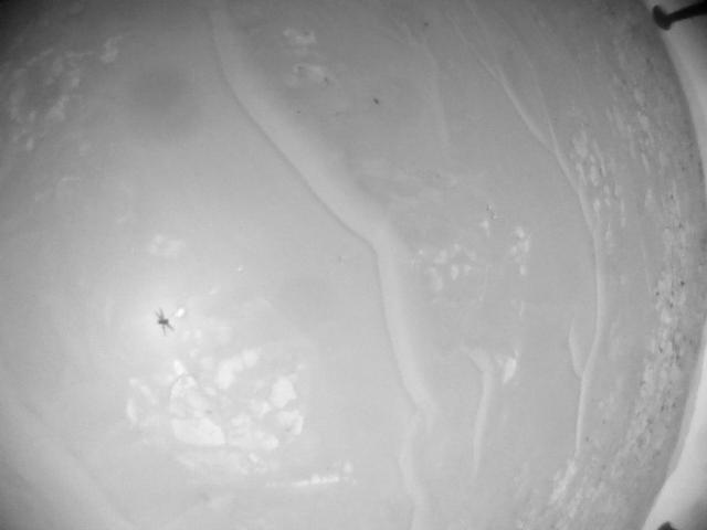 This image was taken by HELI_NAV onboard NASA's Mars rover Perseverance on Sol 955