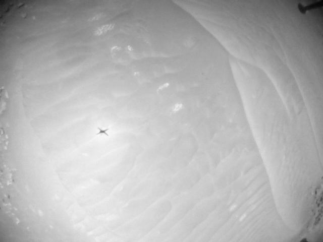 This image was taken by HELI_NAV onboard NASA's Mars rover Perseverance on Sol 990