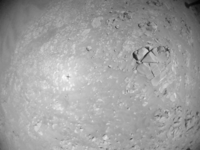 This image was taken by HELI_NAV onboard NASA's Mars rover Perseverance on Sol 990