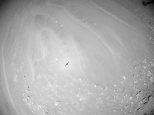 This image was taken by HELI_NAV onboard NASA's Mars rover Perseverance on Sol 990