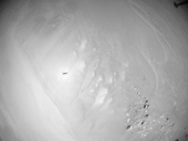 This image was taken by HELI_NAV onboard NASA's Mars rover Perseverance on Sol 990