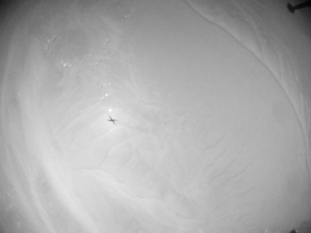 This image was taken by HELI_NAV onboard NASA's Mars rover Perseverance on Sol 990