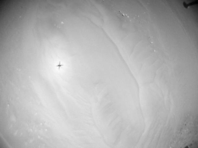 This image was taken by HELI_NAV onboard NASA's Mars rover Perseverance on Sol 990