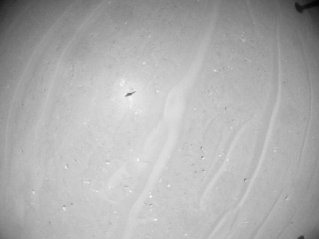 This image was taken by HELI_NAV onboard NASA's Mars rover Perseverance on Sol 990