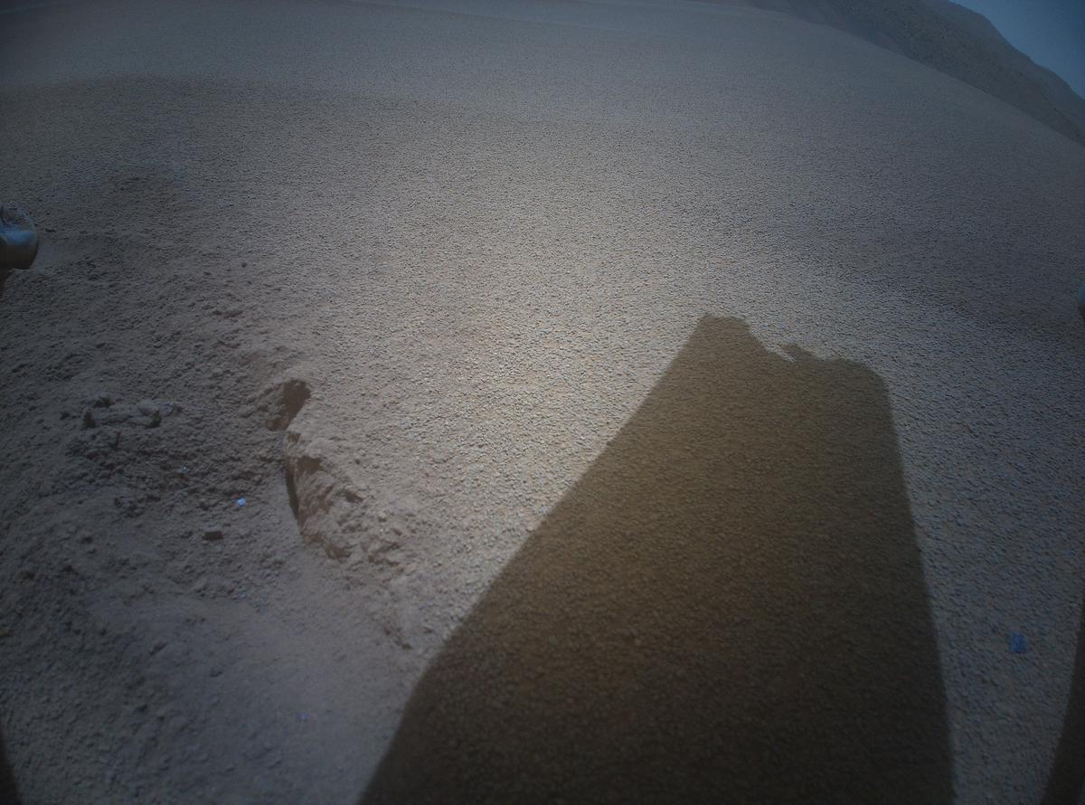 This image was taken by HELI_RTE onboard NASA's Mars rover Perseverance on Sol 1054