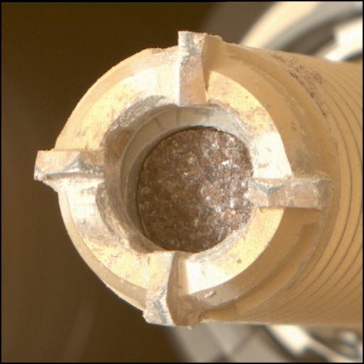Mastcam-Z image of the Comet Geyser core. The partially illuminated core is visible in this image of Perseverance’s coring bit. The diameter of the core is 1.3 cm.