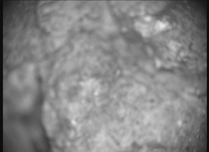 A raw close-up image from Perseverance's SHERLOC context camera on Mars.