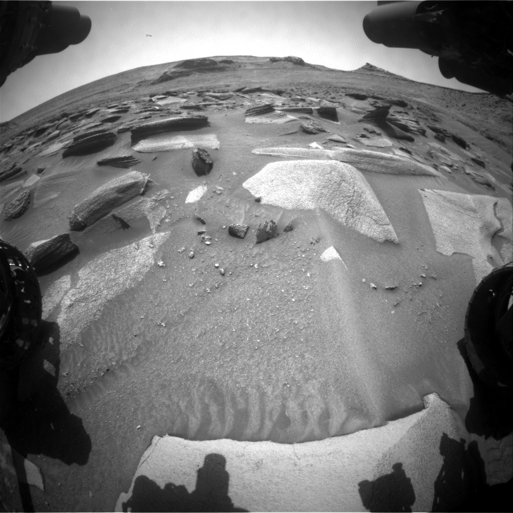 Nasa's Mars rover Curiosity acquired this image using its Front Hazard Avoidance Camera (Front Hazcam) on Sol 3580, at drive 1170, site number 97