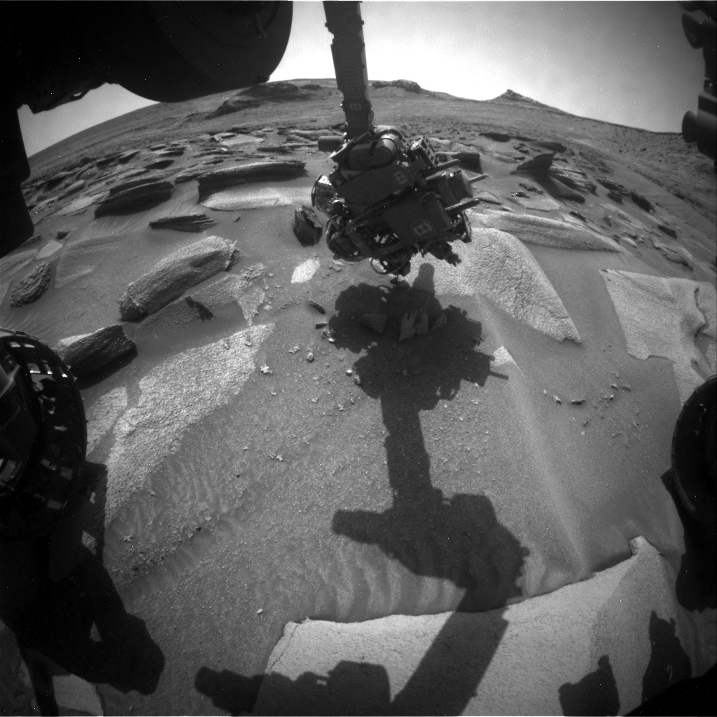 Nasa's Mars rover Curiosity acquired this image using its Front Hazard Avoidance Camera (Front Hazcam) on Sol 3592, at drive 1170, site number 97