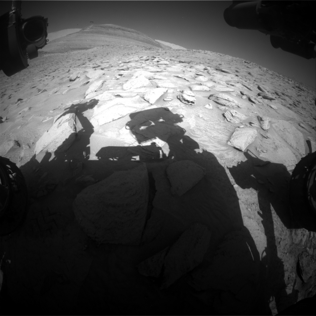 Nasa's Mars rover Curiosity acquired this image using its Front Hazard Avoidance Camera (Front Hazcam) on Sol 3823, at drive 774, site number 101