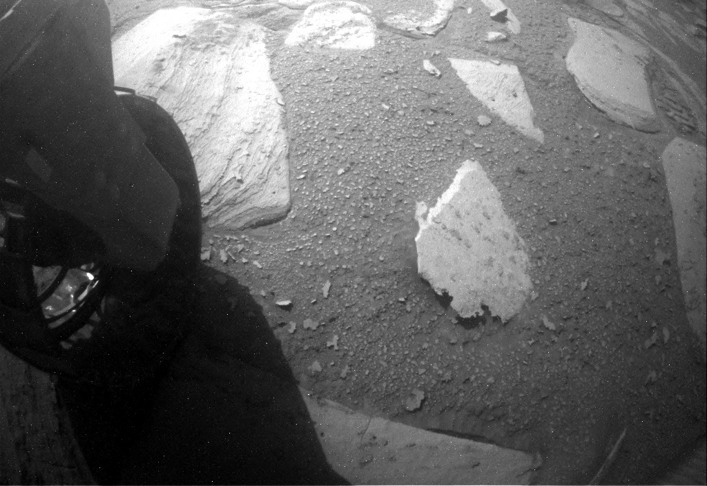Nasa's Mars rover Curiosity acquired this image using its Rear Hazard Avoidance Camera (Rear Hazcam) on Sol 3873, at drive 492, site number 102