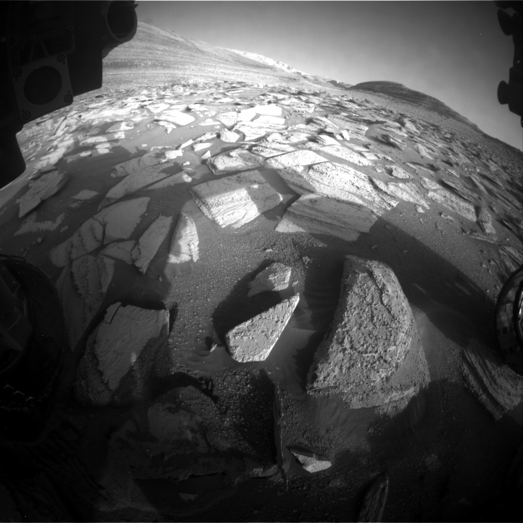 Nasa's Mars rover Curiosity acquired this image using its Front Hazard Avoidance Camera (Front Hazcam) on Sol 4002, at drive 418, site number 105