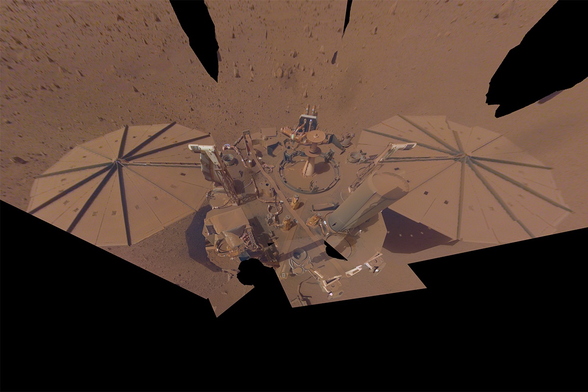 slide 3 - This image shows InSight's final selfie, taken on April 24, 2022, the 1,211th Martian day, or sol, of the mission, with the lander covered in dust. 