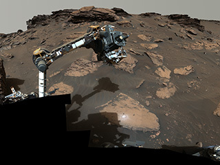 NASA’s Perseverance puts its robotic arm to work around a rocky outcrop called "Skinner Ridge" in a set of images captured in June and July 2022 by the rover’s Mastcam-Z camera system.