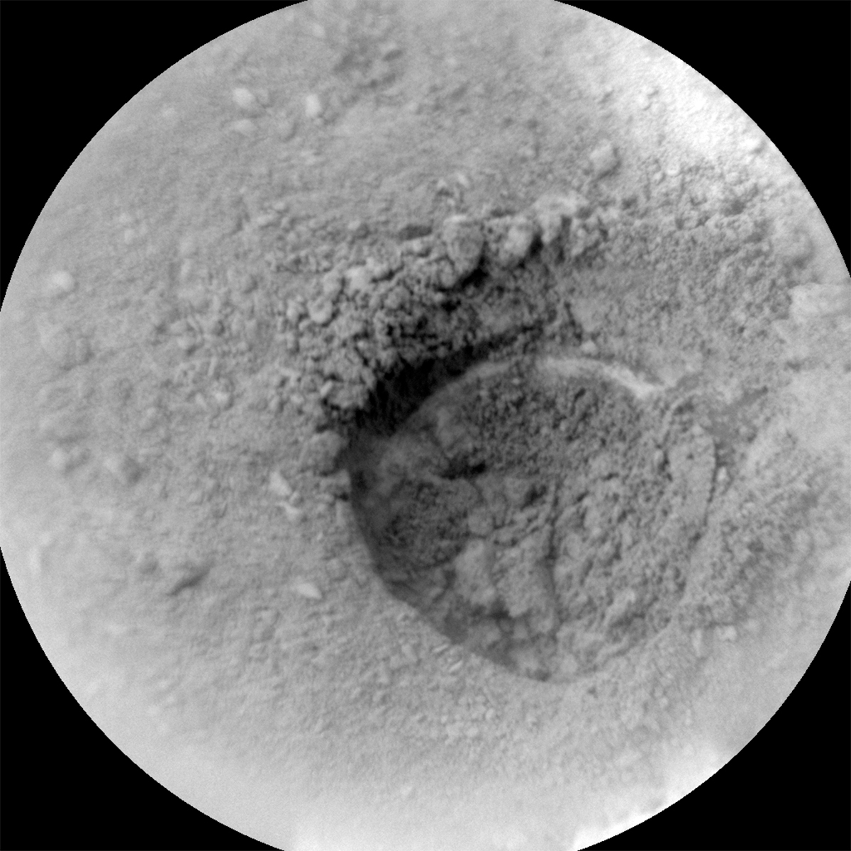 This image of a hole in the soil was taken by Chemistry &amp; Camera (ChemCam) onboard NASA's Mars rover Curiosity on Sol 3720.