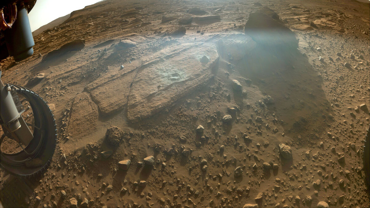 Perseverance Samples 'Berea': This image shows the rocky outcrop the Perseverance science team calls “Berea” after the NASA Mars rover extracted a rock core (right) and abraded a circular patch (left). Credits: NASA/JPL-Caltech. Download image ›