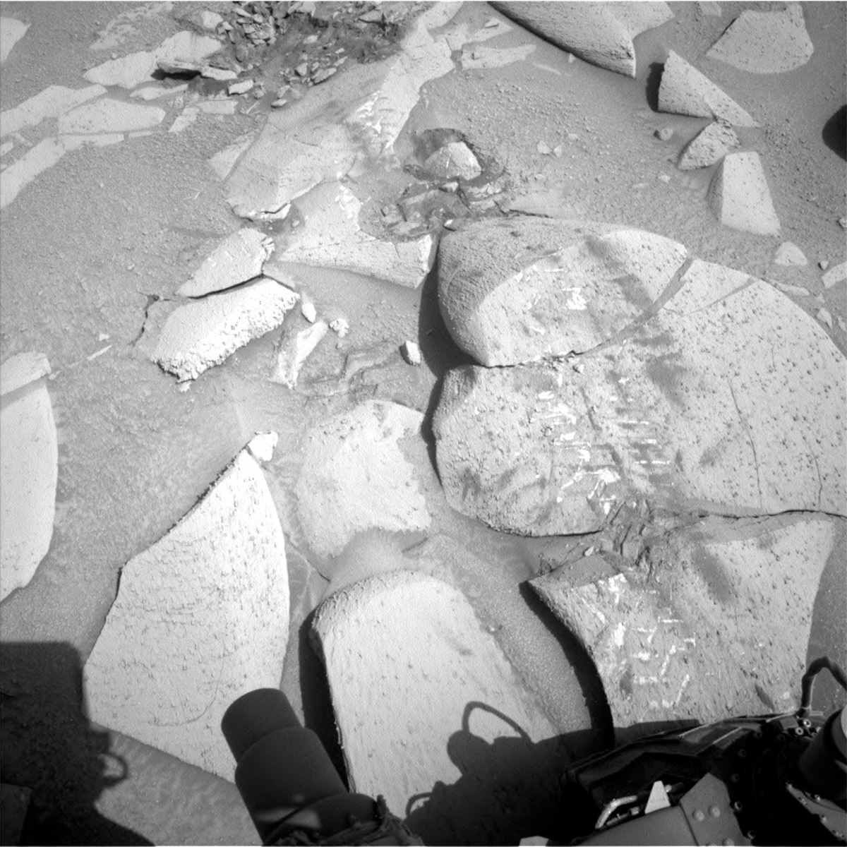 This image shows the scuffed bedrock and sand in the workspace including the “Pepejoe” target and was taken by Curiosity's Navcam on Sol 3803.