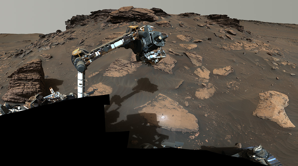 NASA’s Perseverance puts its robotic arm to work around a rocky outcrop called 