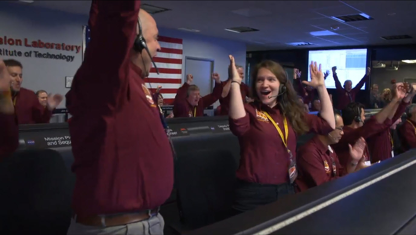 The NASA InSight team reacts after receiving confirmation that the spacecraft successfully touched down on the surface of Mars, inside the Mission Support Area at NASA's Jet Propulsion Laboratory in Pasadena, California. 