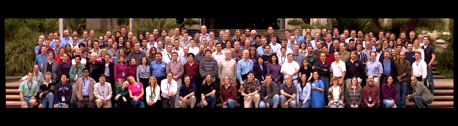 Scientists and engineers working on NASA’s Mars Exploration Rover mission gather for a team portrait during the rovers’ prime mission on Mars in 2004 at NASA’s Jet Propulsion Laboratory in Pasadena, California.