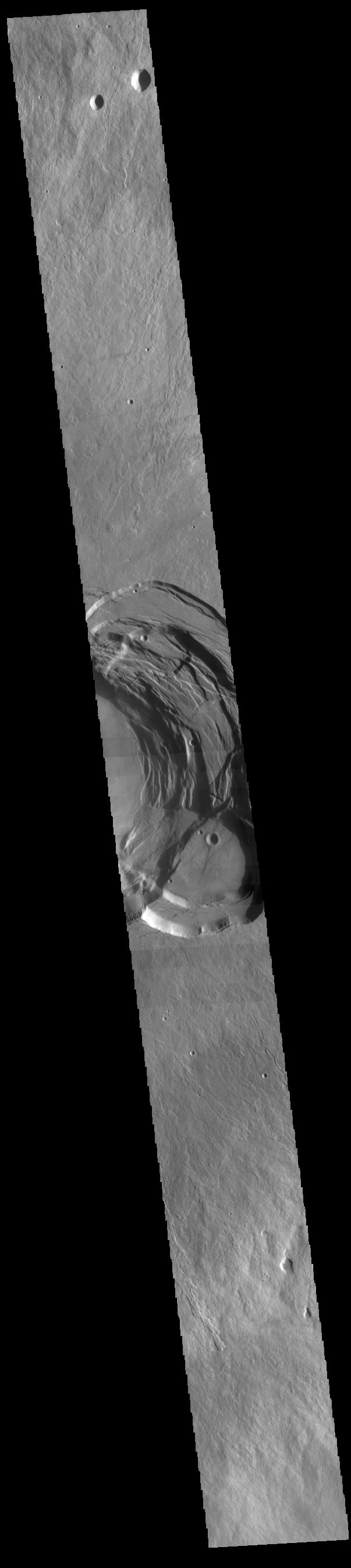 This image from NASAs Mars Odyssey shows the summit of Ascraeus Mons. Ascraeus Mons is the northernmost of the three aligned Tharsis volcanoes.