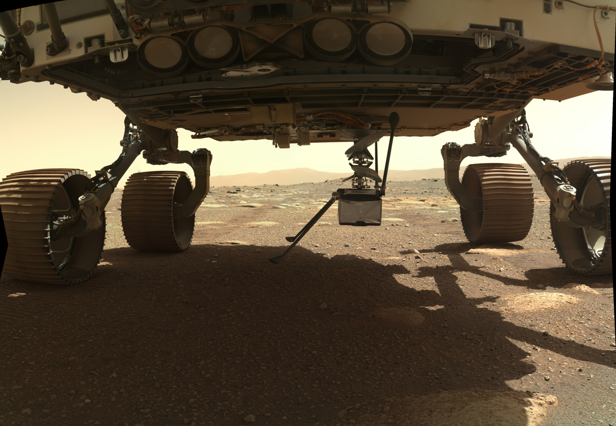 Ingenuity Mars Helicopter extends vertically into place under the rover's belly