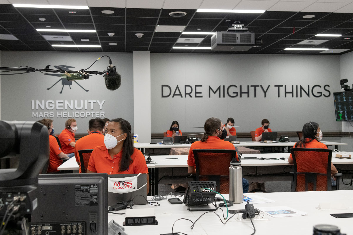 Members of NASA’s Ingenuity helicopter team in the Space Flight Operations Facility at NASA’s Jet Propulsion Laboratory prepare to receive the data downlink showing whether the helicopter completed its first flight on April 19, 2021.