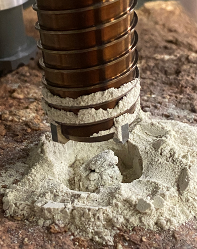 Engineers at NASA’s Jet Propulsion Laboratory performed tests on rocks such as this one to understand why the first attempt by the agency’s Perseverance rover resulted in a powderized sample. A duplicate of the rover’s drill attempted to create cores from crumbly rocks. 