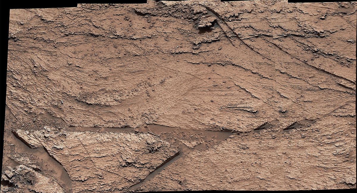 NASA’s Curiosity Mars rover captured evidence of layers that built up as windblown sand both accumulated and was scoured away at a location nicknamed “Las Claritas" – this image was captured using Curiosity’s Mast Camera, or Mastcam, on May 19, 2022, the 3,478th Martian day, or sol, of the mission.