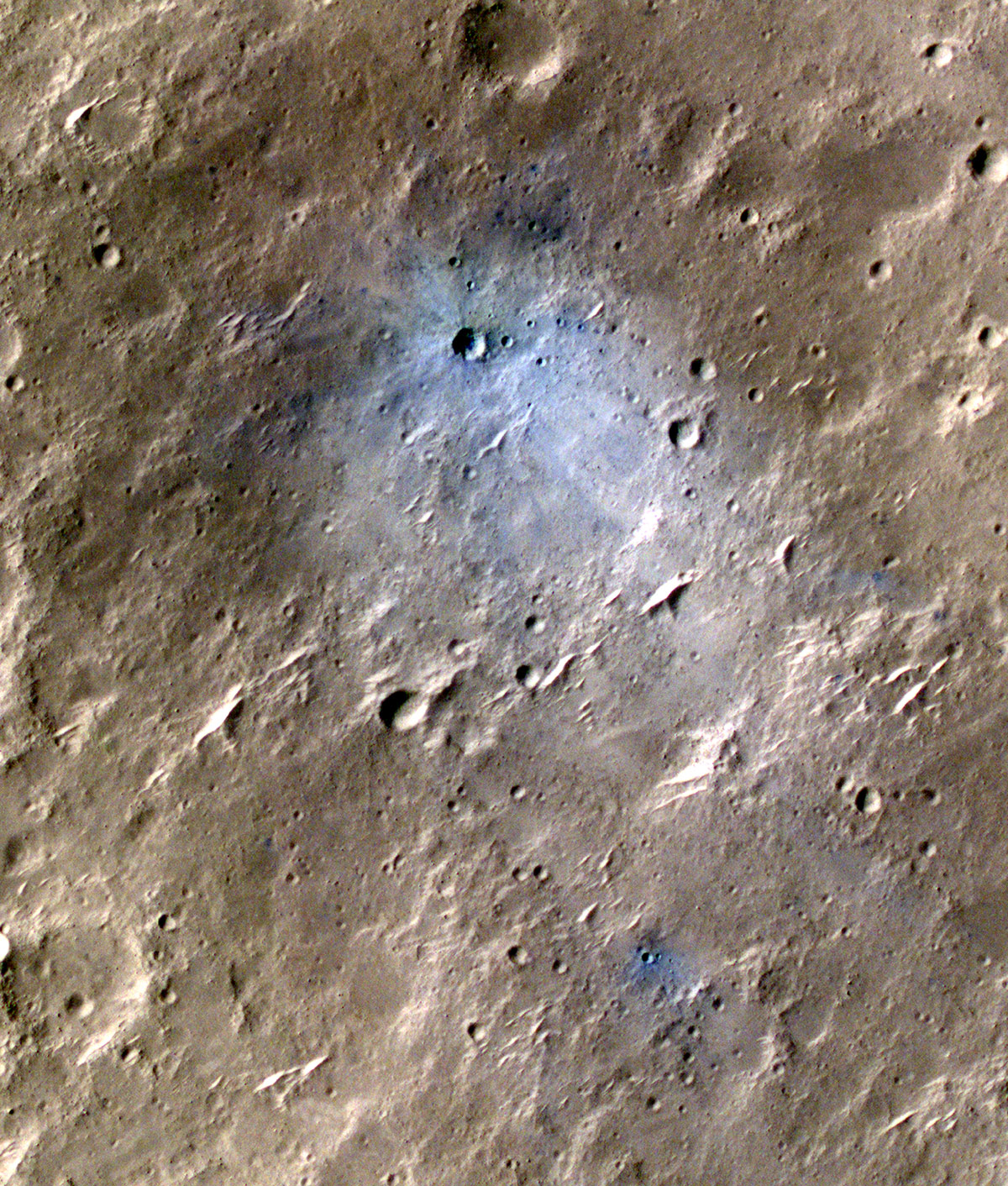 NASA’s Mars Reconnaissance Orbiter captured this image of a meteoroid impact that was later associated with a seismic event detected by the agency’s InSight lander using its seismometer. This crater was formed on May 27, 2020.