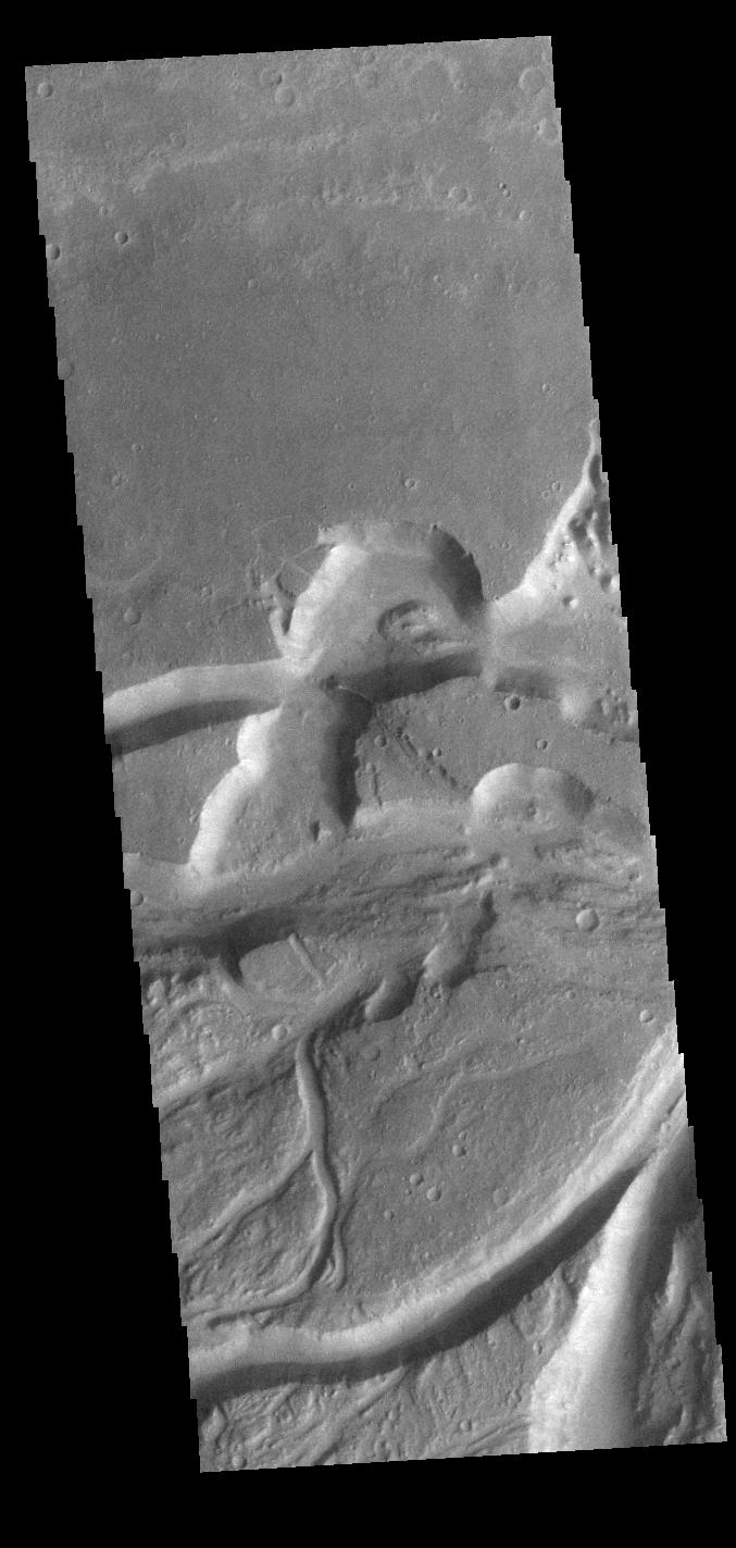 This image from NASAs Mars Odyssey shows a small section of Osuga Valles.