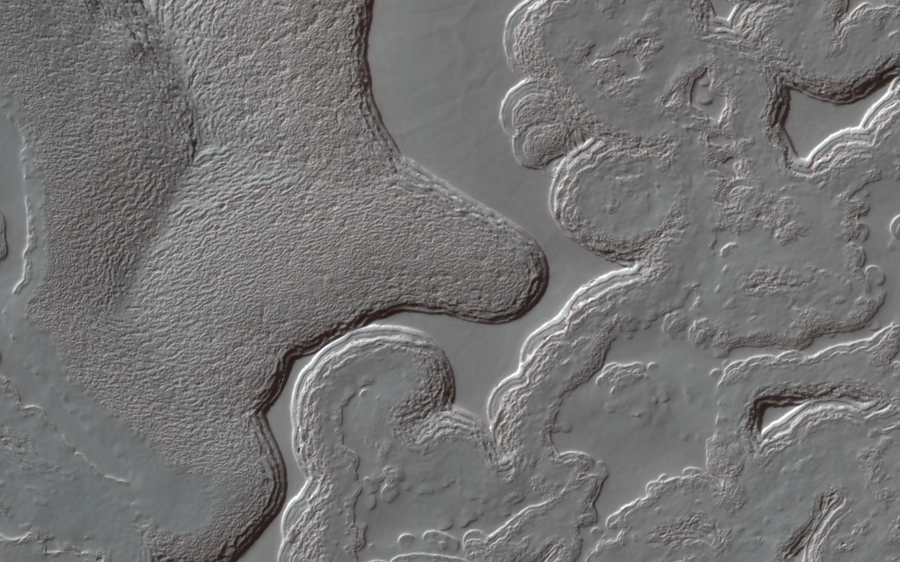 This image acquired on July 14, 2022 by NASAs Mars Reconnaissance Orbiter shows an area in the South Polar cap.