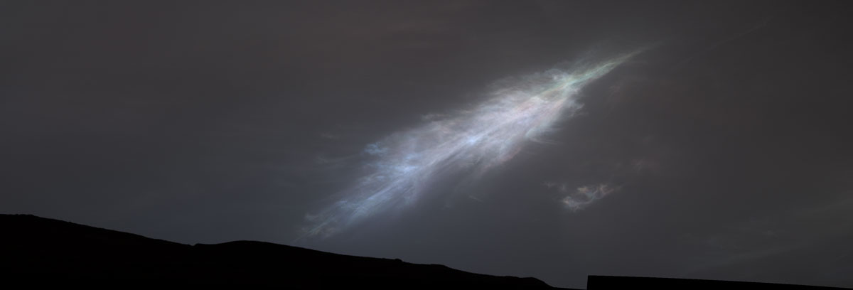 This feather-shaped iridescent cloud was captured just after sunset on Jan. 27, 2023, the 3,724th Martian day, or sol, of Curiosity’s mission.