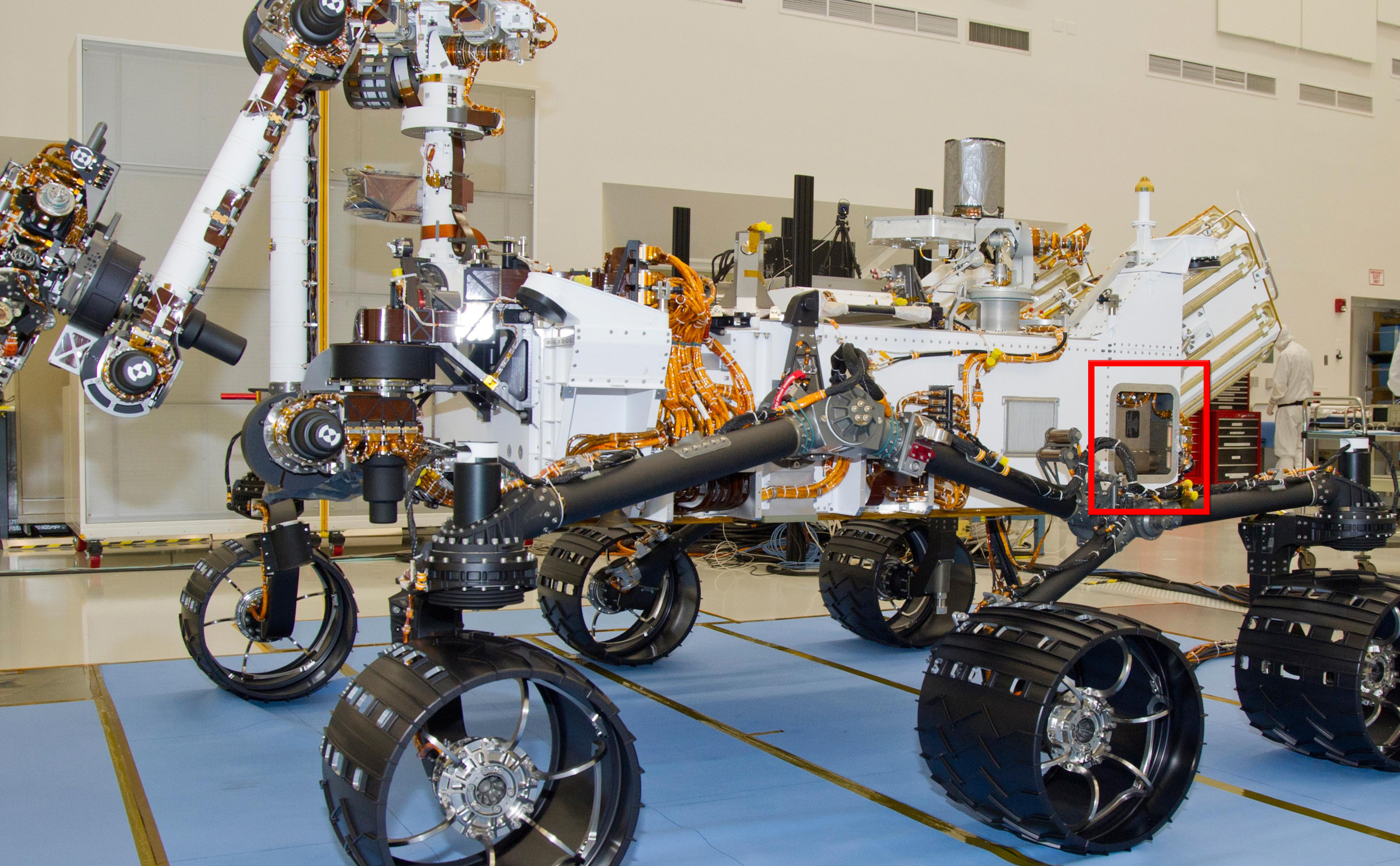 A Russian-built, neutron-shooting instrument on the Curiosity rover of NASA's Mars Science Laboratory mission will check for water-bearing minerals in the ground beneath the rover.