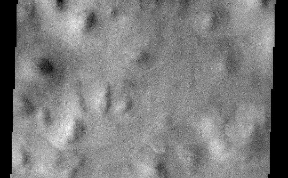Hills abound in this portion of Mars located in the Vastitas Borealis region of the high northern plains. These hills are part of Scandia Colles. Note that some of the hills have aprons surrounding them. The northern part of Milankovic crater is visible in the lower portion of this image.