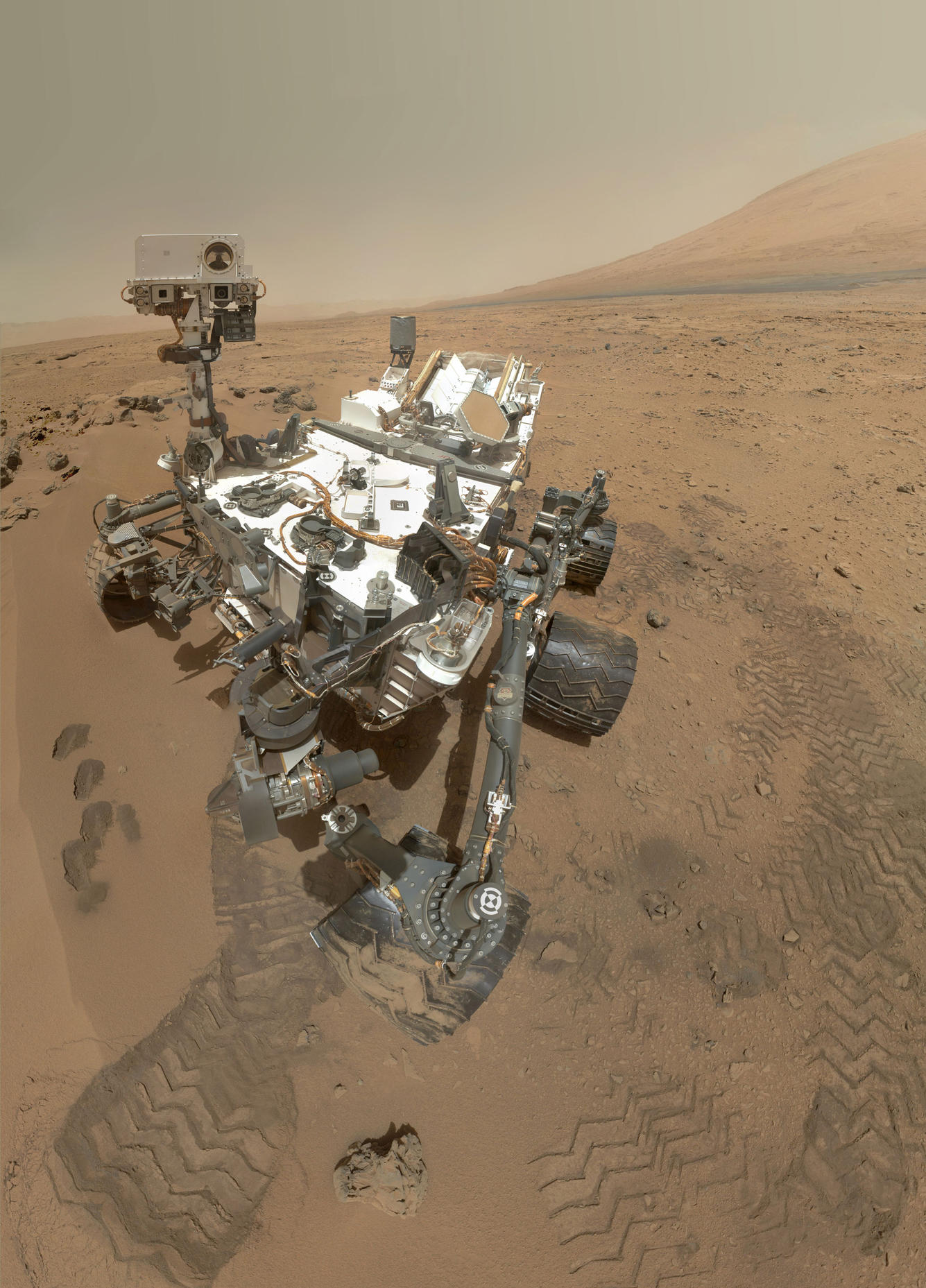 On Sol 84 (Oct. 31, 2012), NASA's Curiosity rover used the Mars Hand Lens Imager (MAHLI) to capture this set of 55 high-resolution images, which were stitched together to create this full-color self-portrait.