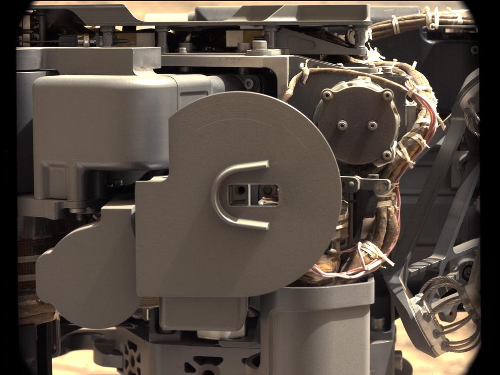 The left Mast Camera (Mastcam) on NASA's Mars rover Curiosity took this image of Curiosity's sample-processing and delivery tool just after the tool delivered a portion of powdered rock into the rover's Sample Analysis at Mars (SAM) instrument.