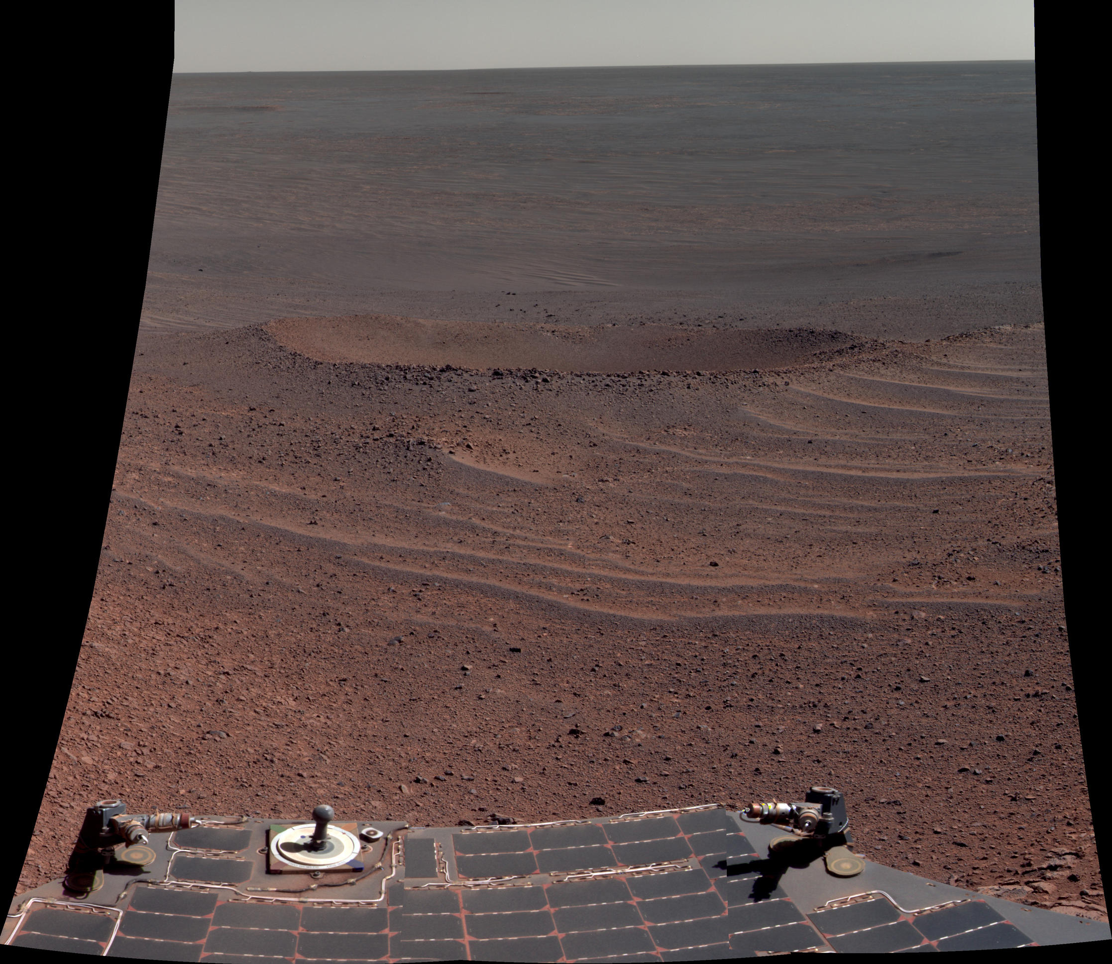 This false-color view from NASA's Mars Exploration Rover Opportunity shows "Lunokhod 2 Crater," which lies south of Solander Point on the west rim of Endeavour Crater.