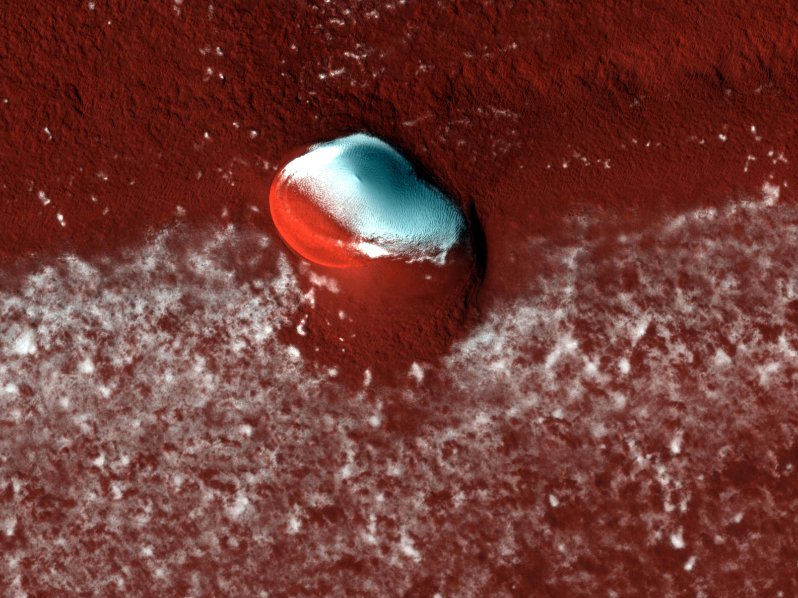 An image of the north polar layered deposits on Mars and the bright ice cap that covers them.
