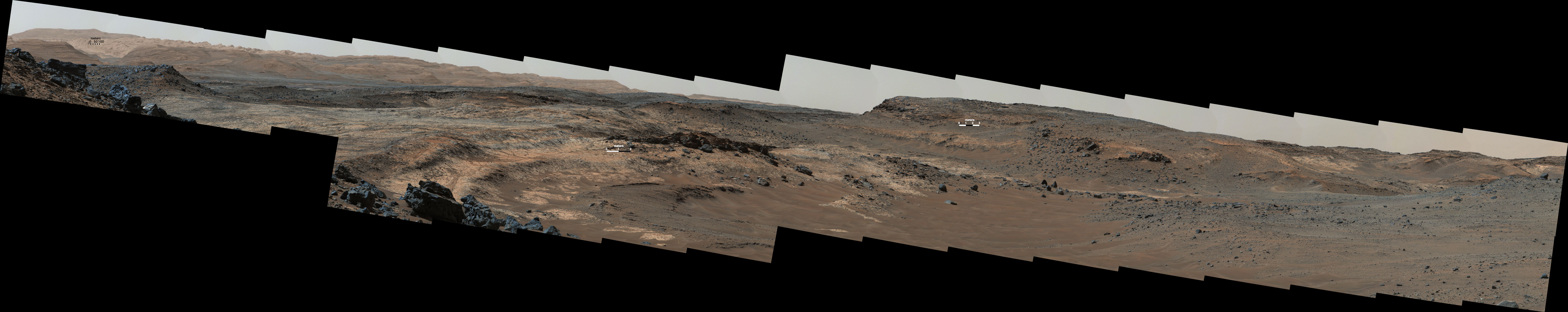 A sweeping panorama combining 33 telephoto images into one Martian vista presents details of several types of terrain visible on Mount Sharp from a location along the route of NASA's Curiosity Mars rover. The component images were taken by the rover's Mast Camera on April 10, 2015.
